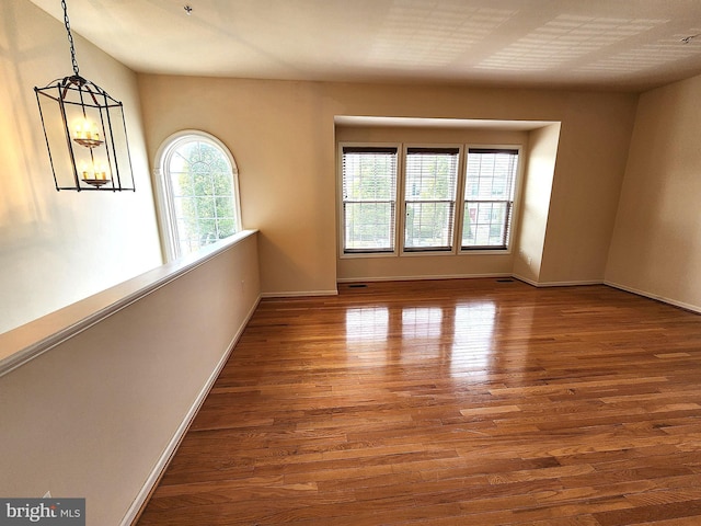 10361 Bridle Ct, Hagerstown, MD 21740 - empty room featuring wood finished floors and baseboards