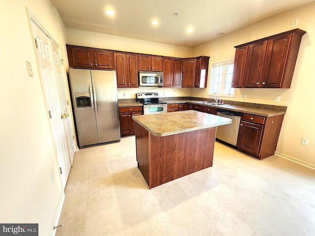 10361 Bridle Ct, Hagerstown, MD 21740 - kitchen featuring appliances with stainless steel finishes, a sink, a center island, recessed lighting, and baseboards