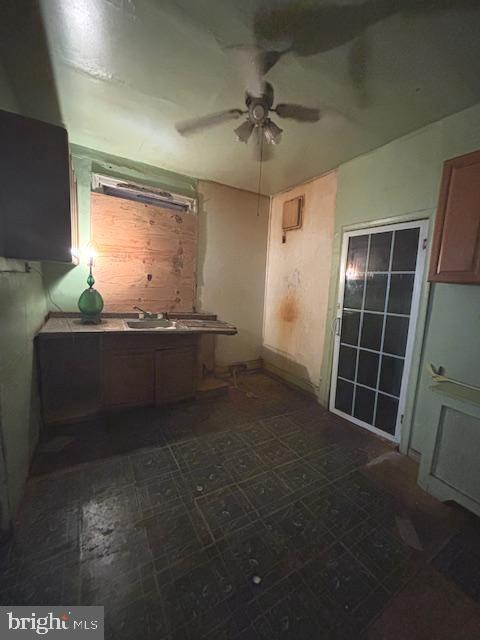 5328 Willows Ave, Philadelphia, PA 19143 - kitchen featuring a ceiling fan and a sink