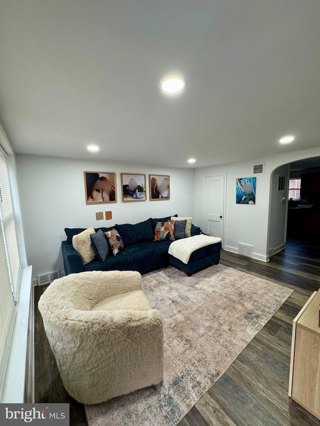 4475 E Allen St, Philadelphia, PA 19137 - living room featuring dark wood-style floors, recessed lighting, arched walkways, and baseboards