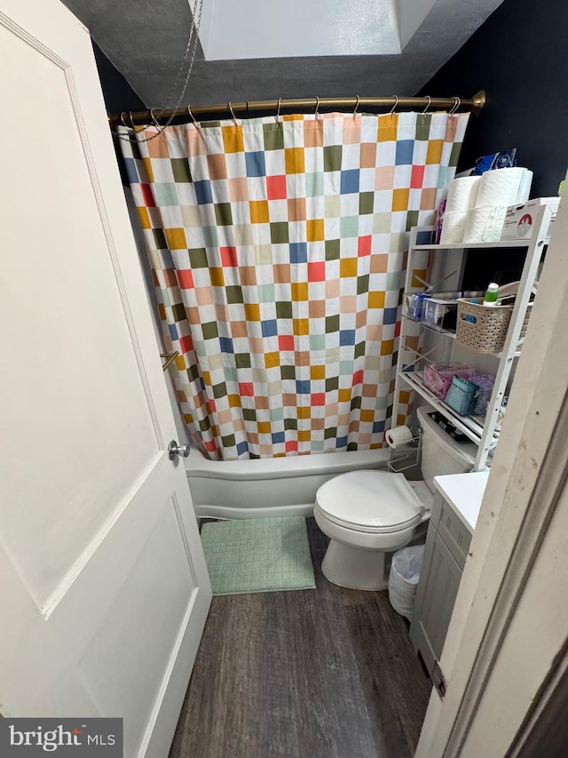4475 E Allen St, Philadelphia, PA 19137 - bathroom featuring wood finished floors, toilet, vanity, and shower / tub combo with curtain