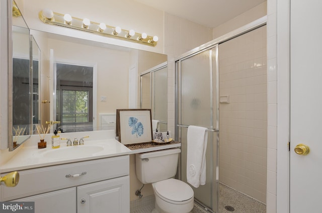 27 Stonehenge Cir Unit 27-11, Baltimore, MD 21208 - full bathroom featuring a shower stall, vanity, and toilet