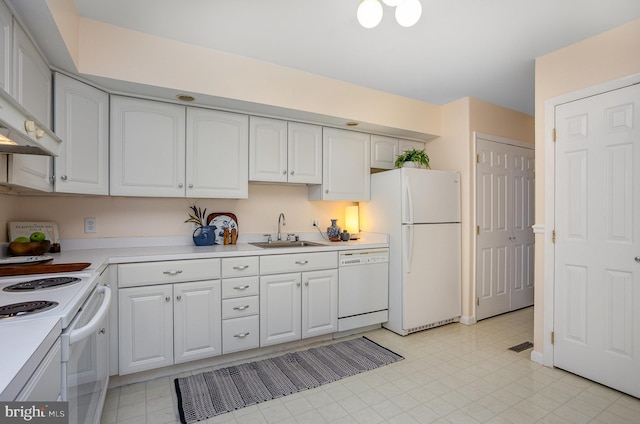 27 Stonehenge Cir Unit 27-11, Baltimore, MD 21208 - kitchen with white appliances, a sink, light countertops, white cabinets, and wall chimney exhaust hood