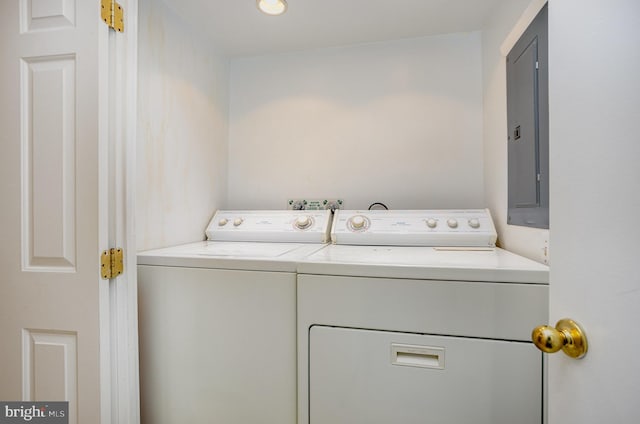 27 Stonehenge Cir Unit 27-11, Baltimore, MD 21208 - laundry area with washer and dryer, electric panel, and recessed lighting