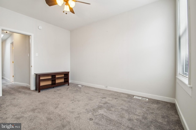 3305 Fleet St, Baltimore, MD 21224 - carpeted empty room with ceiling fan and baseboards