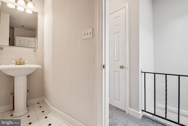 3305 Fleet St, Baltimore, MD 21224 - bathroom featuring baseboards