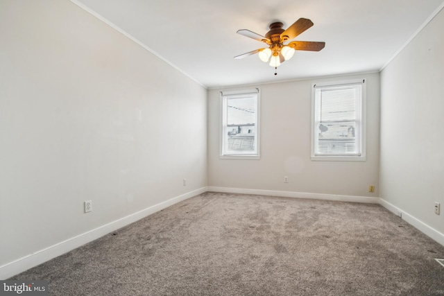 3305 Fleet St, Baltimore, MD 21224 - carpeted empty room featuring ceiling fan, crown molding, and baseboards
