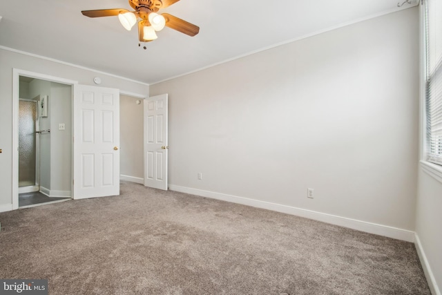 3305 Fleet St, Baltimore, MD 21224 - unfurnished bedroom featuring carpet floors, baseboards, ornamental molding, and a ceiling fan