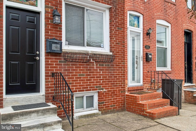 3305 Fleet St, Baltimore, MD 21224 - doorway to property with brick siding