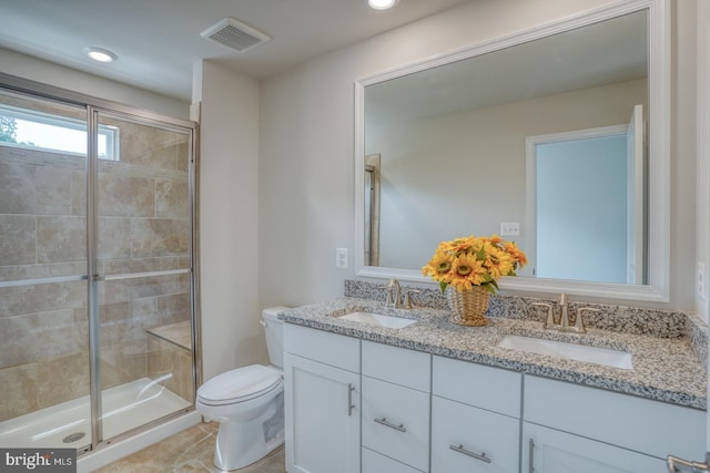 35141 Wright Way, Millsboro, DE 19966 - full bathroom featuring double vanity, toilet, a shower stall, and tile patterned floors