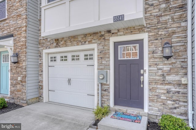 35141 Wright Way, Millsboro, DE 19966 - property entrance featuring stone siding and a garage