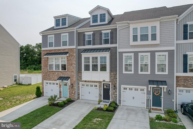 35141 Wright Way, Millsboro, DE 19966 - multi unit property with stone siding, driveway, an attached garage, and a front yard