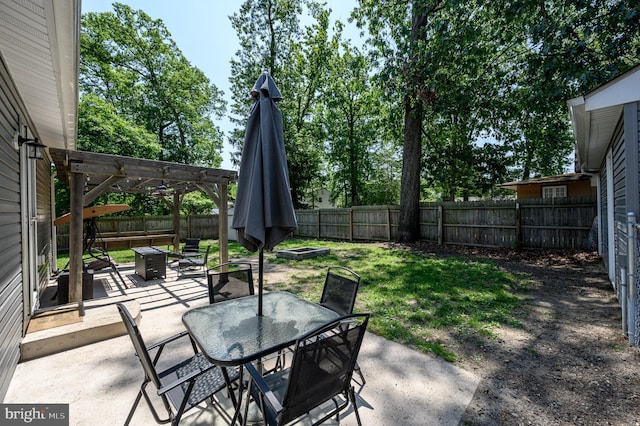 119 Truro St, Browns Mills, NJ 08015 - fenced backyard featuring a patio, a pergola, outdoor dining space, and a fire pit