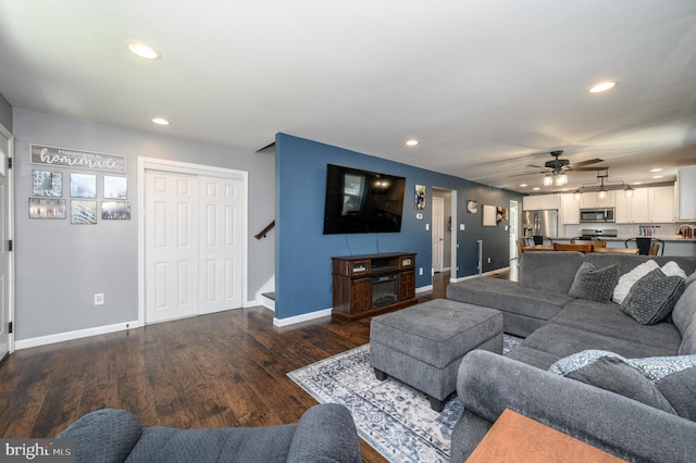 119 Truro St, Browns Mills, NJ 08015 - living room featuring baseboards, recessed lighting, a ceiling fan, dark wood-style floors, and stairway