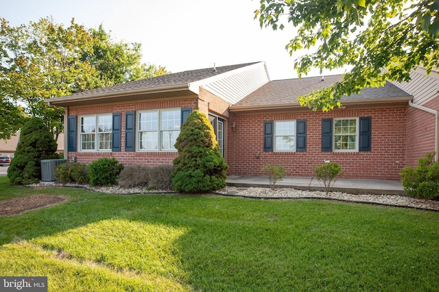 301 Sunbrook Ln Unit 89, Hagerstown, MD 21742 - ranch-style home with brick siding, a front yard, a shingled roof, and central air condition unit