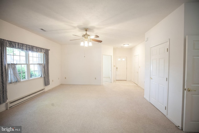 301 Sunbrook Ln Unit 89, Hagerstown, MD 21742 - spare room with a baseboard heating unit, light carpet, and ceiling fan