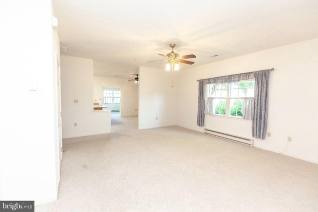 301 Sunbrook Ln Unit 89, Hagerstown, MD 21742 - spare room with a baseboard radiator, light colored carpet, a ceiling fan, and plenty of natural light