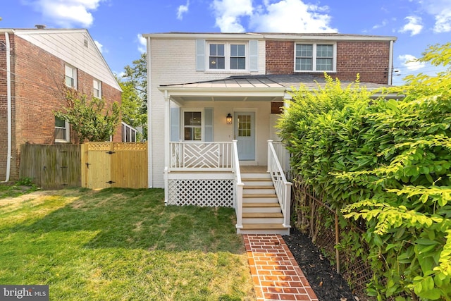 2402 E Randolph Ave, Alexandria, VA 22301 - view of front facade with a gate, brick siding, covered porch, and stairs