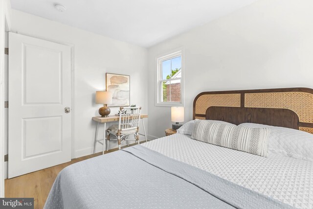 2402 E Randolph Ave, Alexandria, VA 22301 - bedroom with wood finished floors and baseboards