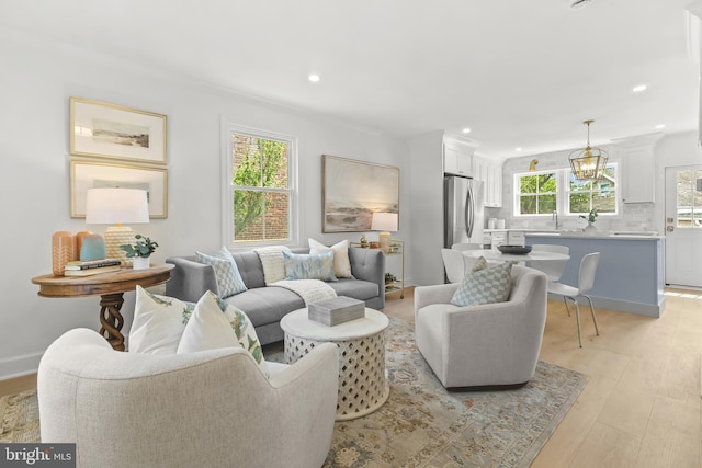 2402 E Randolph Ave, Alexandria, VA 22301 - living area featuring a chandelier, light wood-type flooring, and recessed lighting