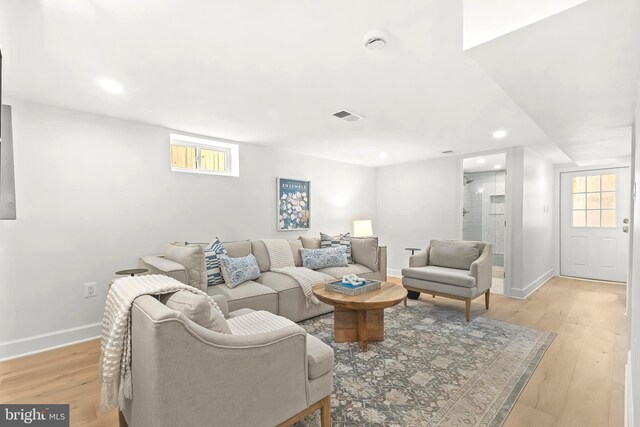 2402 E Randolph Ave, Alexandria, VA 22301 - living room featuring light wood-style flooring, baseboards, and recessed lighting