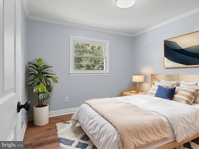 8211 Hocking Pl, Alexandria, VA 22309 - bedroom with ornamental molding, wood finished floors, and baseboards