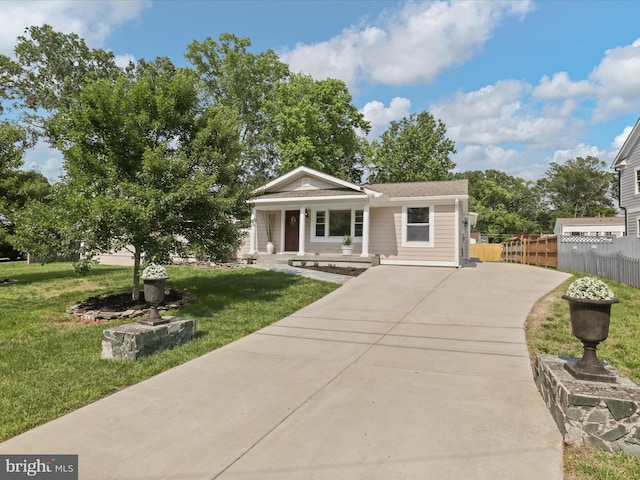 8211 Hocking Pl, Alexandria, VA 22309 - view of front of home with a porch and driveway