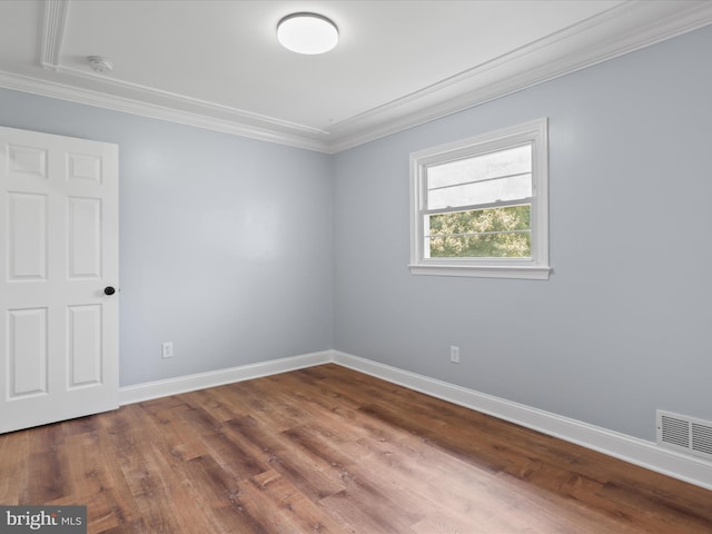 8211 Hocking Pl, Alexandria, VA 22309 - spare room featuring ornamental molding, a smoke detector, wood finished floors, and baseboards