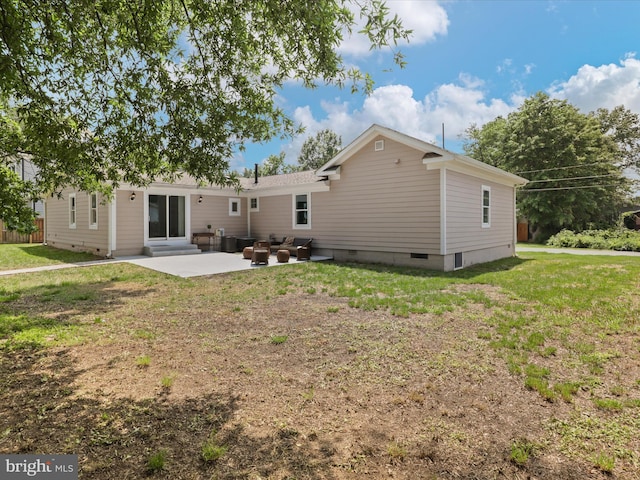 8211 Hocking Pl, Alexandria, VA 22309 - rear view of property with a patio area, a lawn, crawl space, and outdoor lounge area