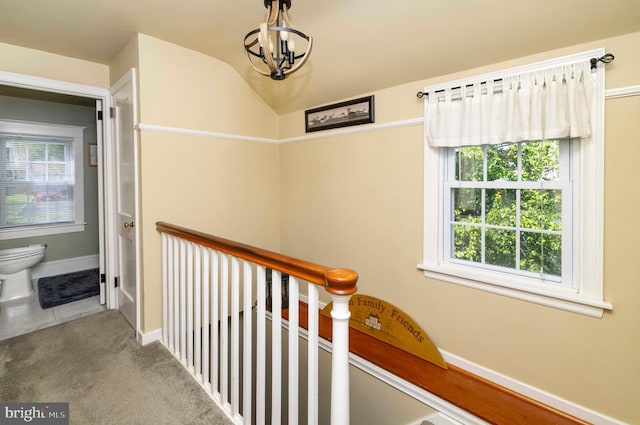 1864 Edge Hill Rd, Abington, PA 19001 - hall featuring a chandelier, plenty of natural light, an upstairs landing, and carpet floors