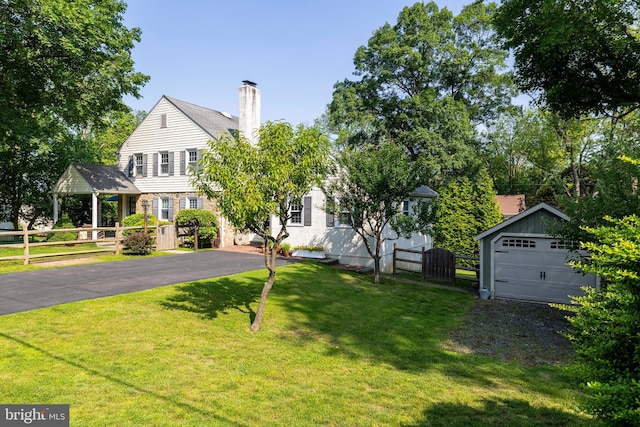 1864 Edge Hill Rd, Abington, PA 19001 - view of front of home featuring a chimney, asphalt driveway, and a gazebo