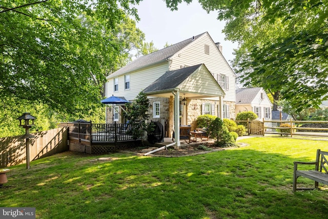 1864 Edge Hill Rd, Abington, PA 19001 - back of property with stone siding, a deck, and a shingled roof