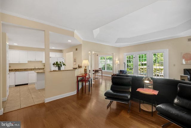 11 Birchwood Ct, Princeton, NJ 08540 - living area featuring light wood-style flooring, crown molding, french doors, a raised ceiling, and recessed lighting