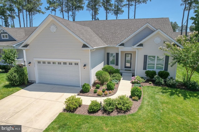 18208 Emerson Way, Georgetown, DE 19947 - view of front facade featuring an attached garage, concrete driveway, a front yard, and a shingled roof