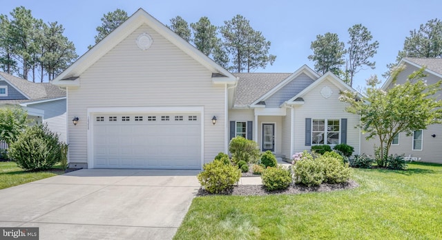 18208 Emerson Way, Georgetown, DE 19947 - view of front facade featuring a garage, driveway, and a front yard