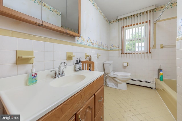 222 Nicholson Rd, Mount Ephraim, NJ 08059 - full bathroom featuring baseboard heating, vanity, toilet, tile walls, and bathing tub / shower combination