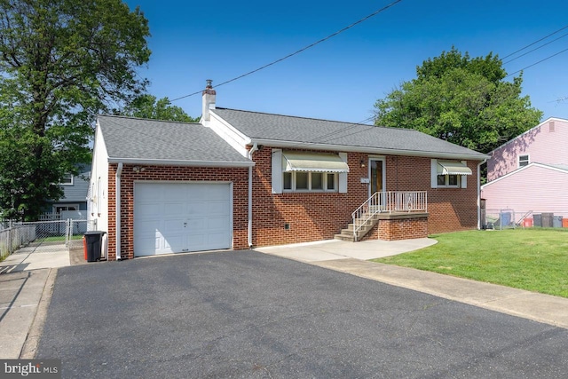 222 Nicholson Rd, Mount Ephraim, NJ 08059 - view of front of home featuring a garage, brick siding, asphalt driveway, and a chimney