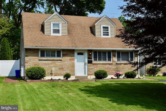 2419 Secane Rd, Secane, PA 19018 - cape cod house featuring stone siding and roof with shingles