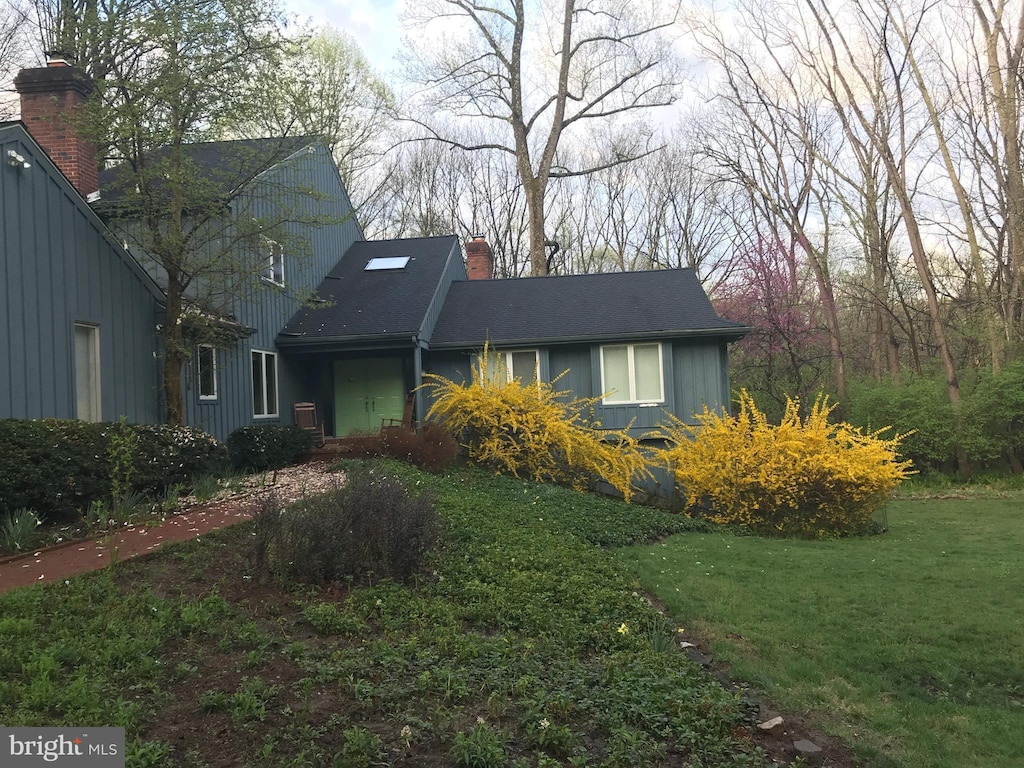 2 Fox Run Dr, Chadds Ford, PA 19317 - view of side of home with a chimney and a yard