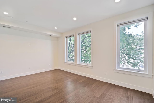 525 Kennedy St NW Unit 4, Washington, DC 20011 - unfurnished room with plenty of natural light, dark wood-style flooring, baseboards, and recessed lighting
