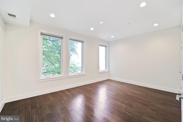 525 Kennedy St NW Unit 4, Washington, DC 20011 - spare room featuring healthy amount of natural light, dark wood-style floors, baseboards, and recessed lighting