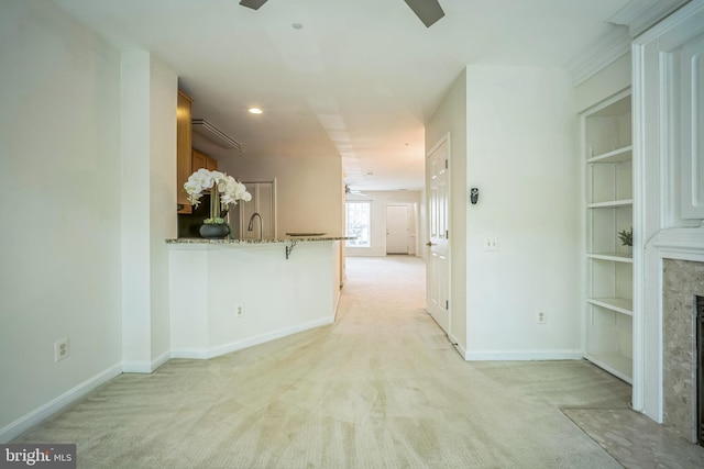 5932 Kimberly Anne Way, Alexandria, VA 22310 - unfurnished living room featuring ceiling fan, light colored carpet, baseboards, a fireplace, and recessed lighting