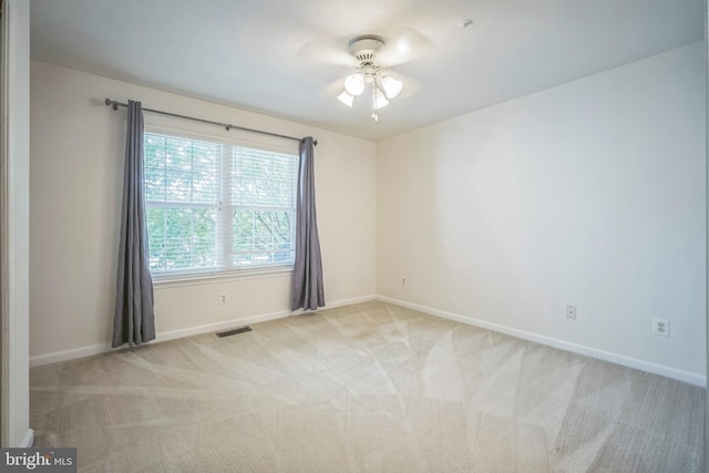 5932 Kimberly Anne Way, Alexandria, VA 22310 - spare room featuring a ceiling fan, carpet floors, and baseboards