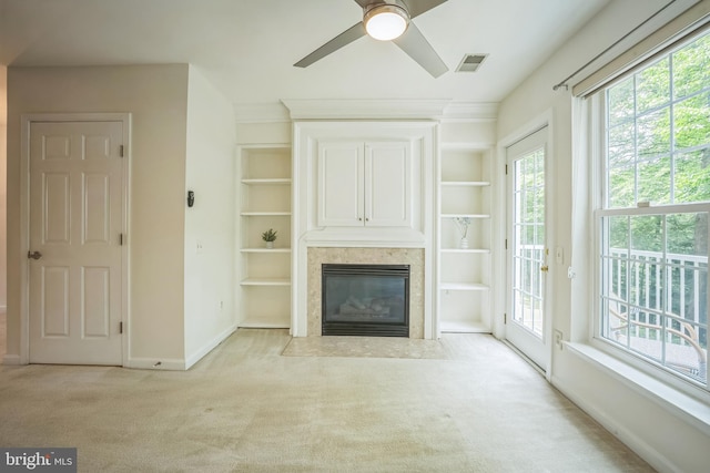 5932 Kimberly Anne Way, Alexandria, VA 22310 - unfurnished living room featuring carpet floors, a fireplace, baseboards, and plenty of natural light