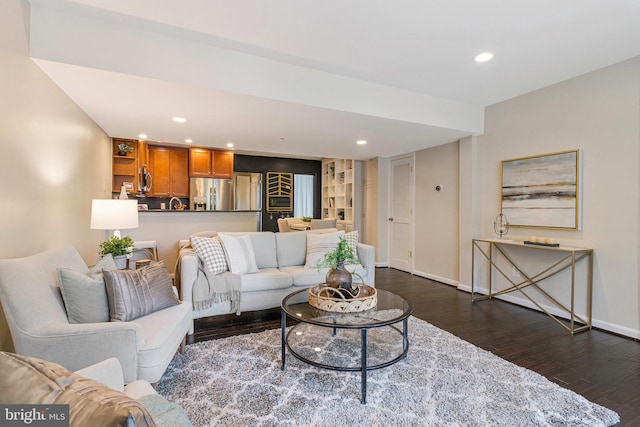 1519 Constitution NE Unit 101, Washington, DC 20002 - living room with dark wood-style flooring, recessed lighting, and baseboards