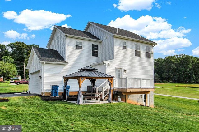 2536 Stoverstown Rd, Spring Grove, PA 17362 - back of property with a gazebo, a yard, asphalt driveway, a wooden deck, and roof with shingles