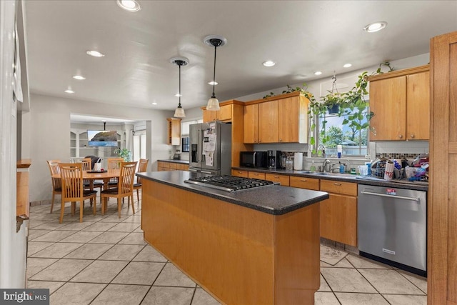1609 Wills Pl, Vineland, NJ 08361 - kitchen featuring appliances with stainless steel finishes, dark countertops, a kitchen island, backsplash, and recessed lighting
