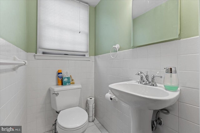 1609 Wills Pl, Vineland, NJ 08361 - half bathroom featuring tile walls, toilet, and wainscoting