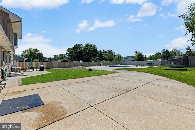 1609 Wills Pl, Vineland, NJ 08361 - view of yard with a patio, a trampoline, and a pool