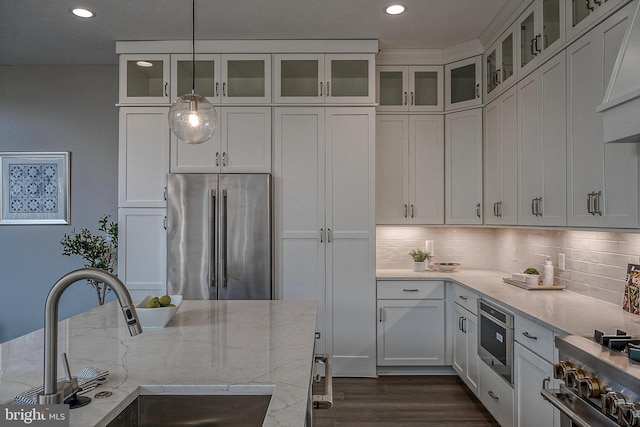547 Webb Rd # Ad, Chadds Ford, PA 19317 - kitchen with premium appliances, a sink, dark wood-style flooring, light stone countertops, and white cabinetry